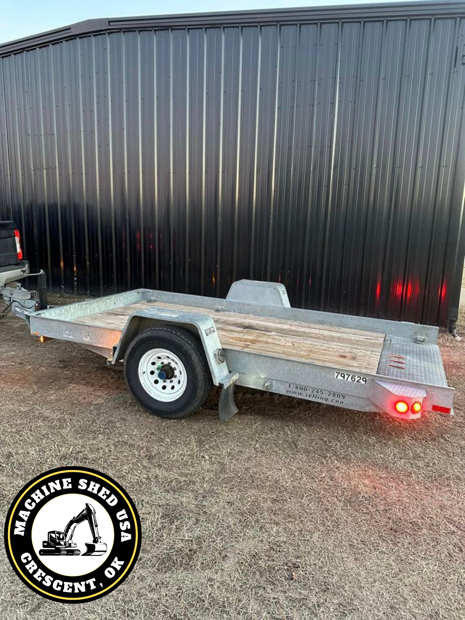 SOLD-12’ Felling commercial Tilt deck trailer.